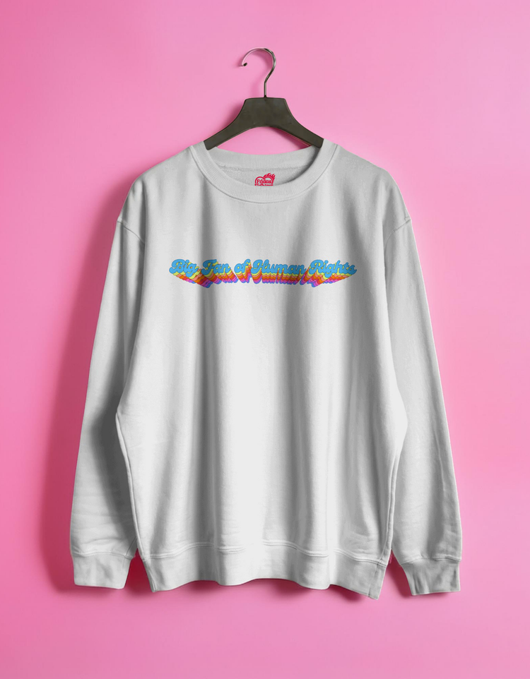 White sweatshirt with colorful text design on a pink background
