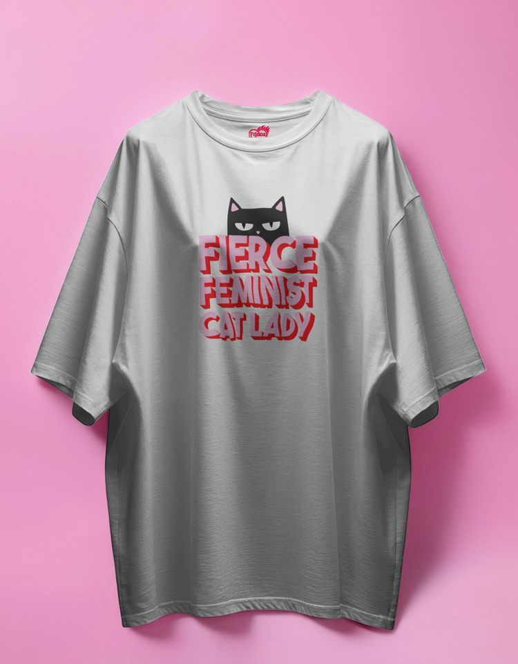 white t-shirt with a cat graphic and text on a pink background