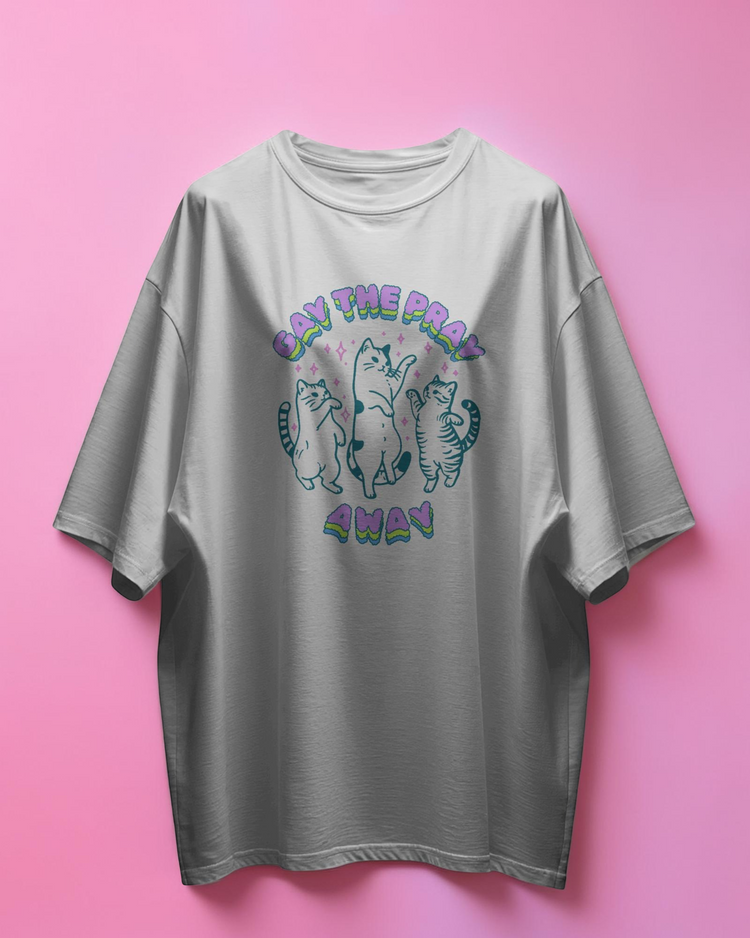 white t-shirt with cat graphic and text on a pink background