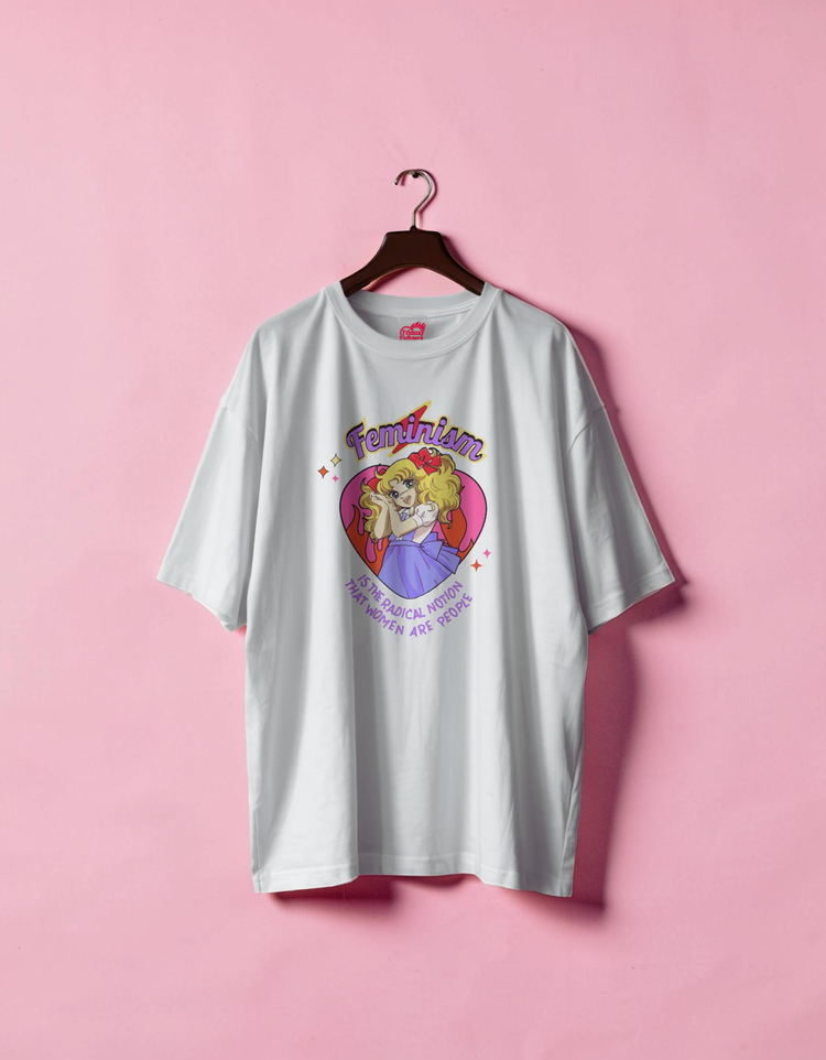 White t-shirt with a graphic design on a pink background