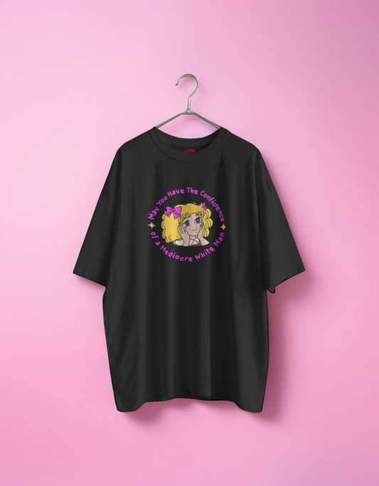 black t-shirt with a graphic design on a pink background