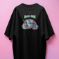 Black t-shirt with a unicorn graphic and 'Alpha Male' text on a pink background