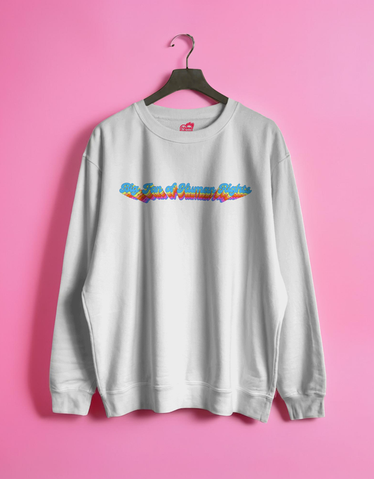White sweatshirt with colorful text design on a pink background