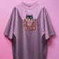 pink t-shirt with a cat graphic and text on a pink background