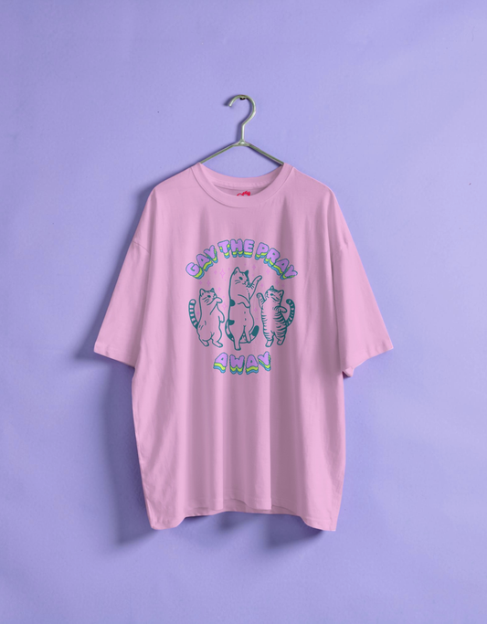 Pink t-shirt with graphic design on a hanger against a purple background