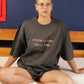 feminist t-shirt with colorful text We'll smile when you're funny