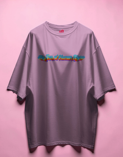 pink t-shirt with colorful text design on a pink background