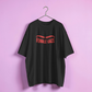 Black t-shirt with 'FEMALE GAZE' text on a pink background