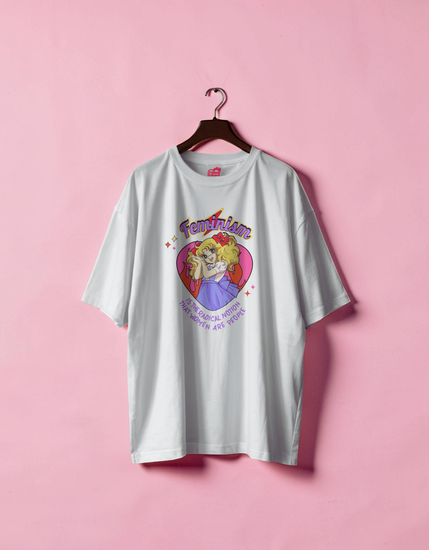 White t-shirt with a graphic design on a pink background
