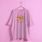 pink t-shirt with a graphic design on a pink background