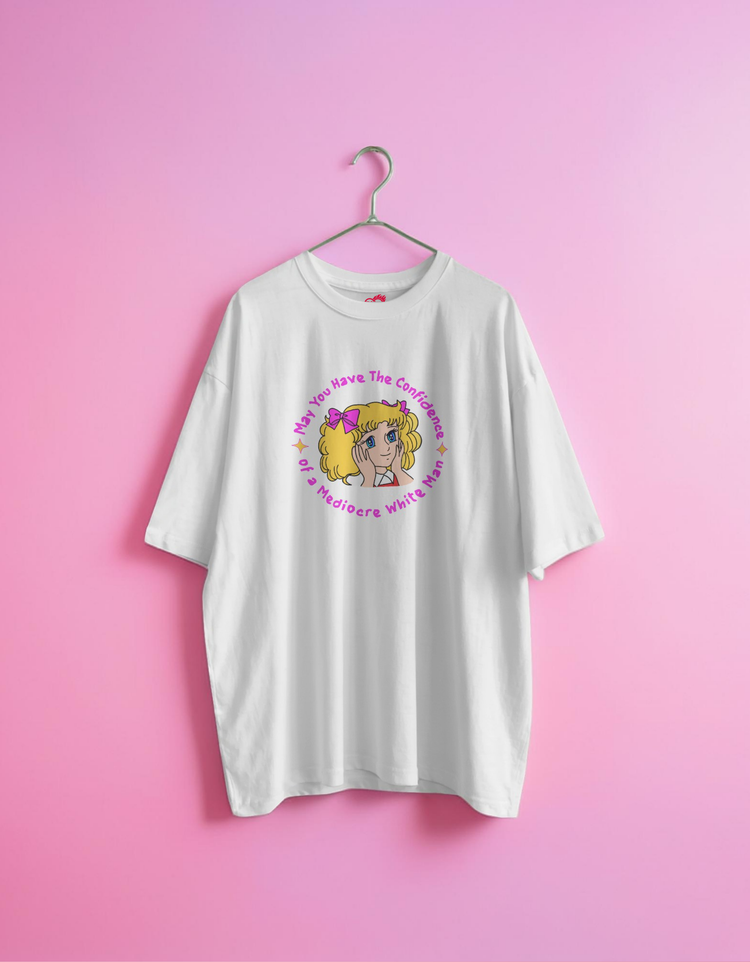 White t-shirt with a graphic design on a pink background