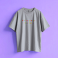 light gray t-shirt with colorful text We'll smile when you're funny