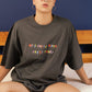 feminist t-shirt with colorful text We'll smile when you're funny